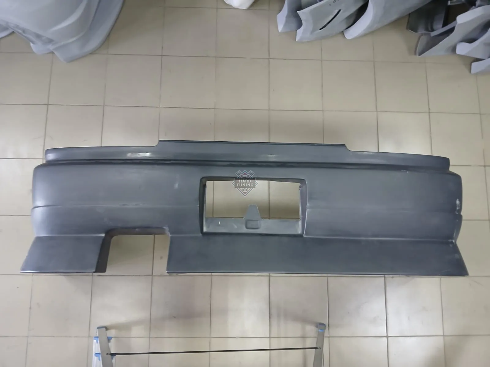 Задний бампер URAS Nissan Skyline R34