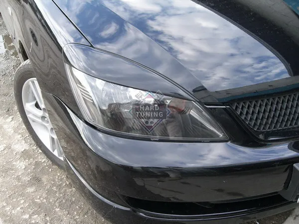 Накладки на фары узкие Mitsubishi Lancer 9 (2003-2009)