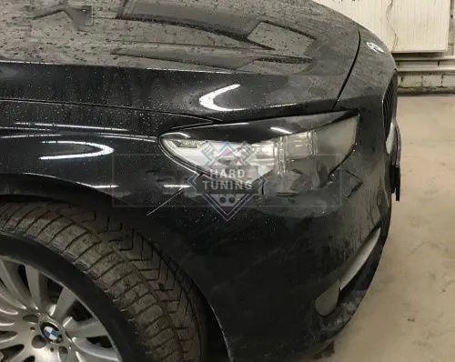 Накладки на фары BMW F07