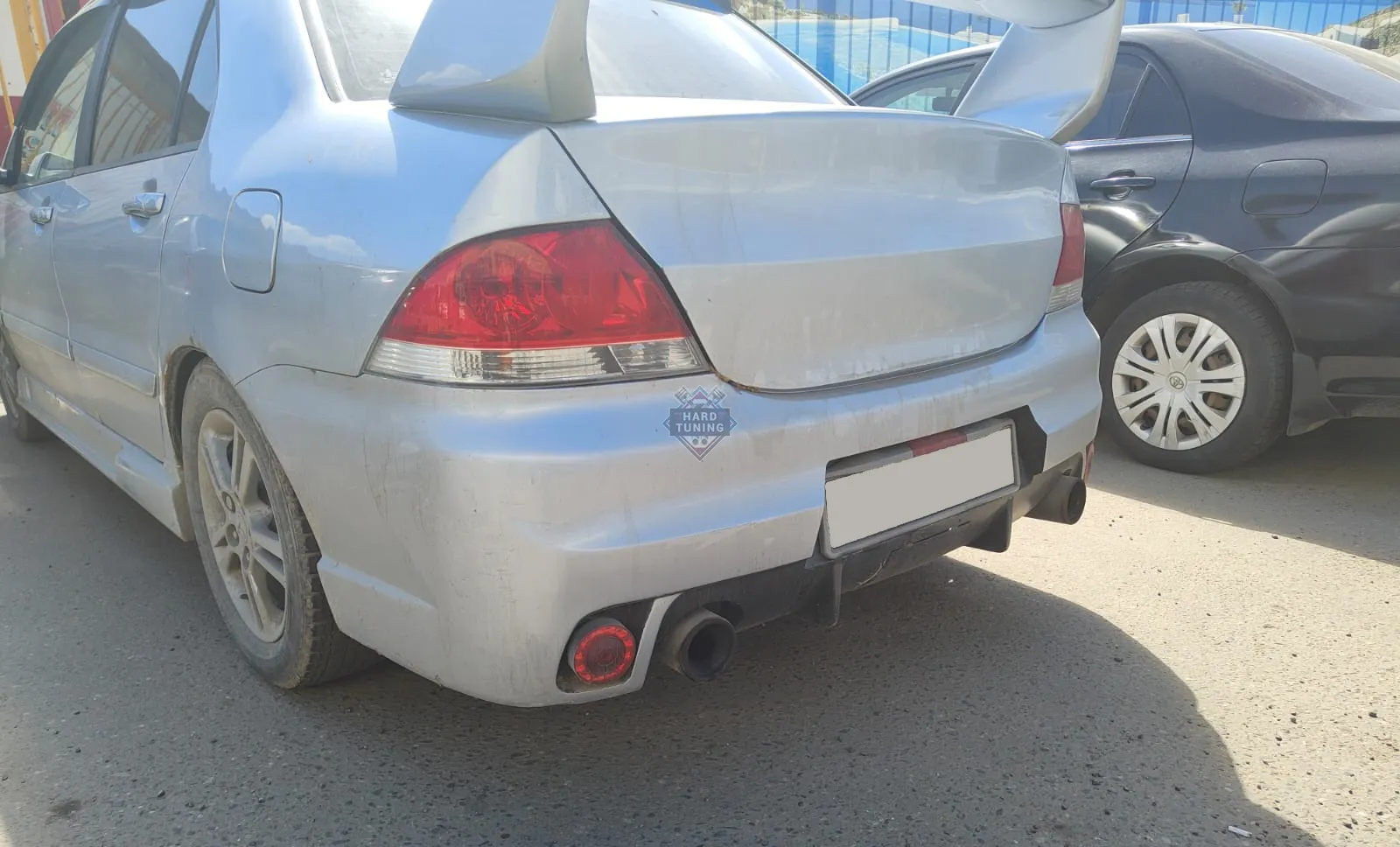 Задний бампер в стиле INGS Extreem под двойной выхлоп Mitsubishi Lancer 9 (2003-2009)