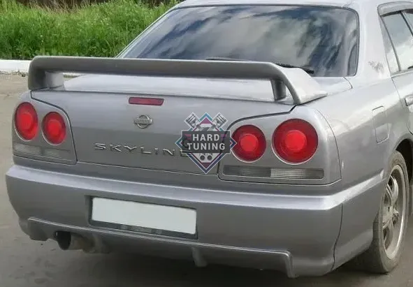 Задний бампер GTR (USA ?) Nissan Skyline R34 седан