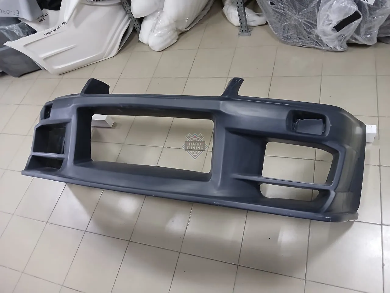 Передний бампер Do-Luck Nissan Skyline R34 GT-R