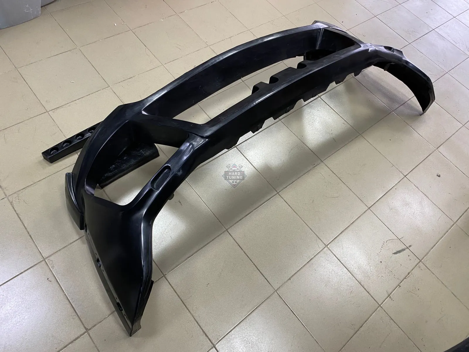 Передний бампер HT Mitsubishi Pajero 4 (2006-2014) дорестайлинг и 1й рестайлинг