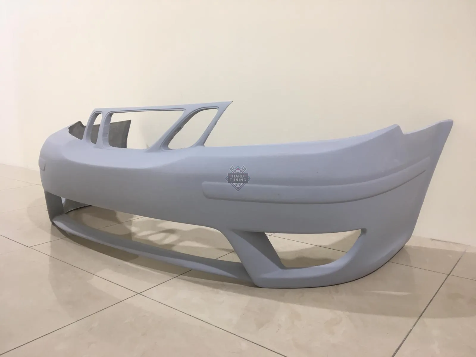 Передний бампер Saab 9-5 дорестайл