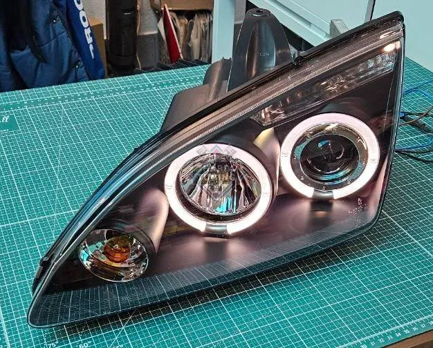 Передние фары FORD FOCUS 2 (2004-2008) ANGEL EYES черные