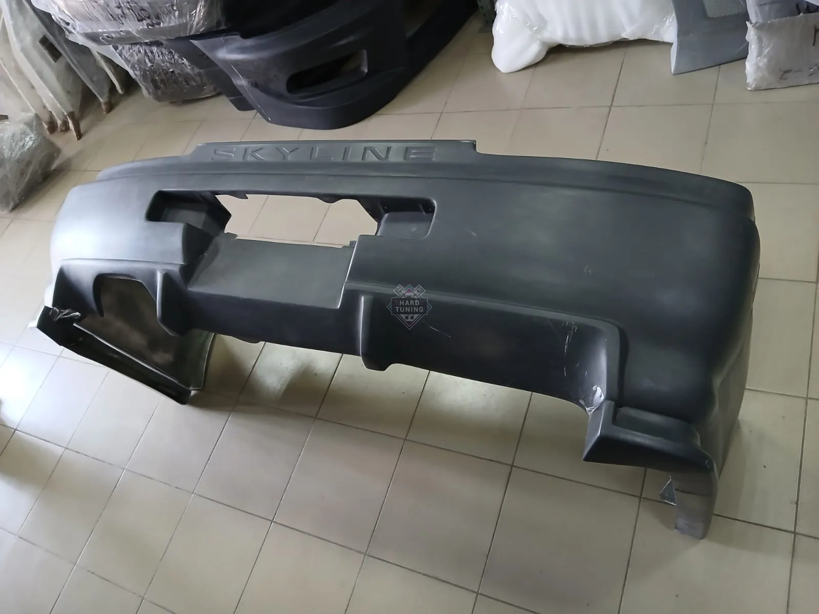 Задний бампер GTR + NISMO Nissan Skyline R34 седан