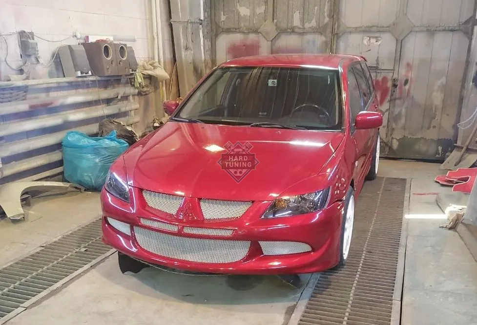 Передний бампер в стиле EVO Mitsubishi Lancer 9 (2003-2009)