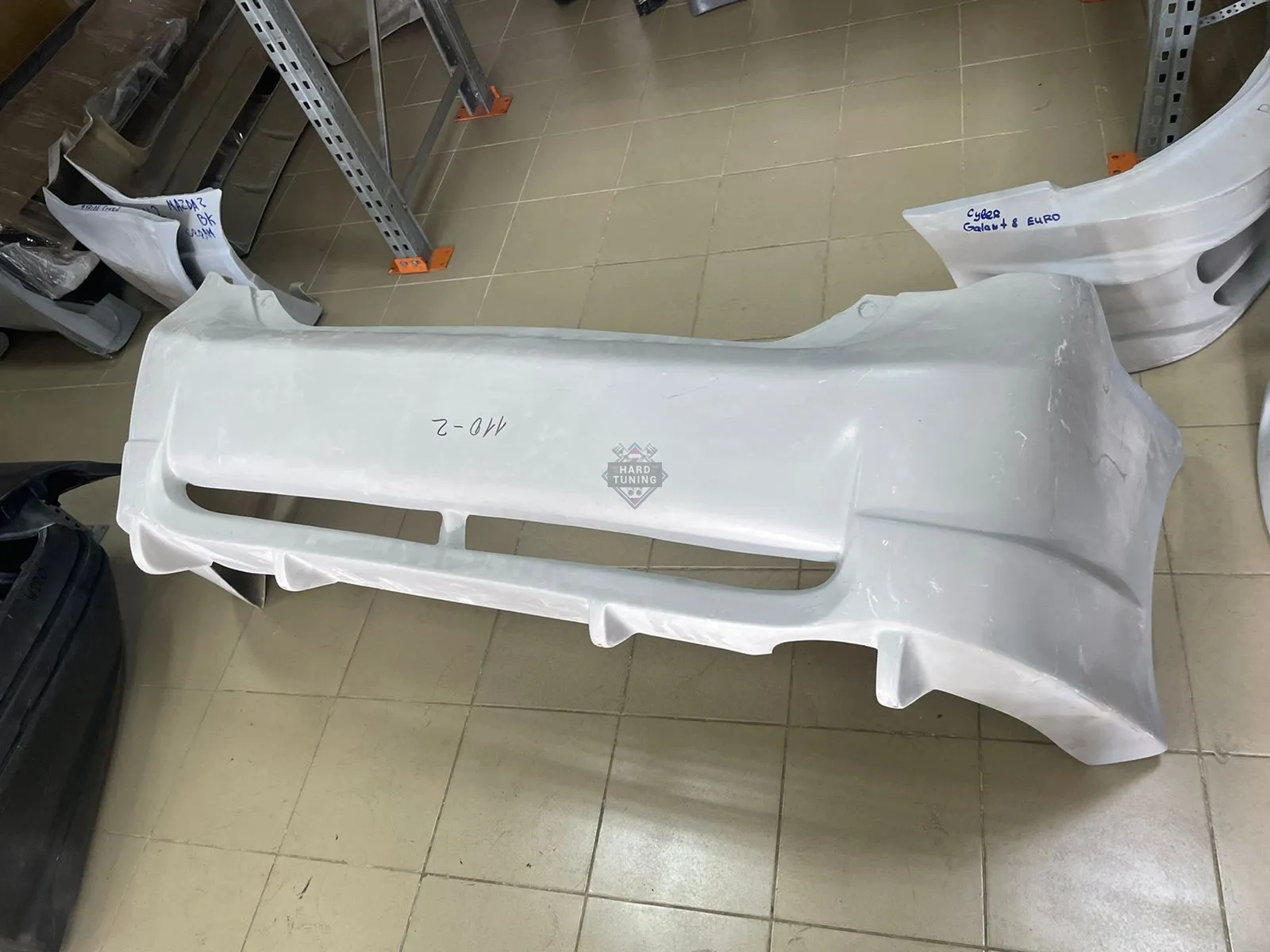 Задний бампер Toyota Corolla E140/E150 дорестайлинг