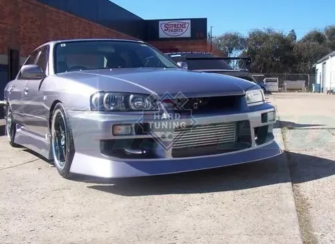 Передний бампер URAS Nissan Skyline R34
