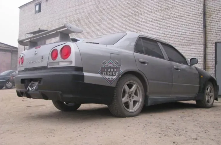 Задний бампер GTR Japan Nissan Skyline R34 седан