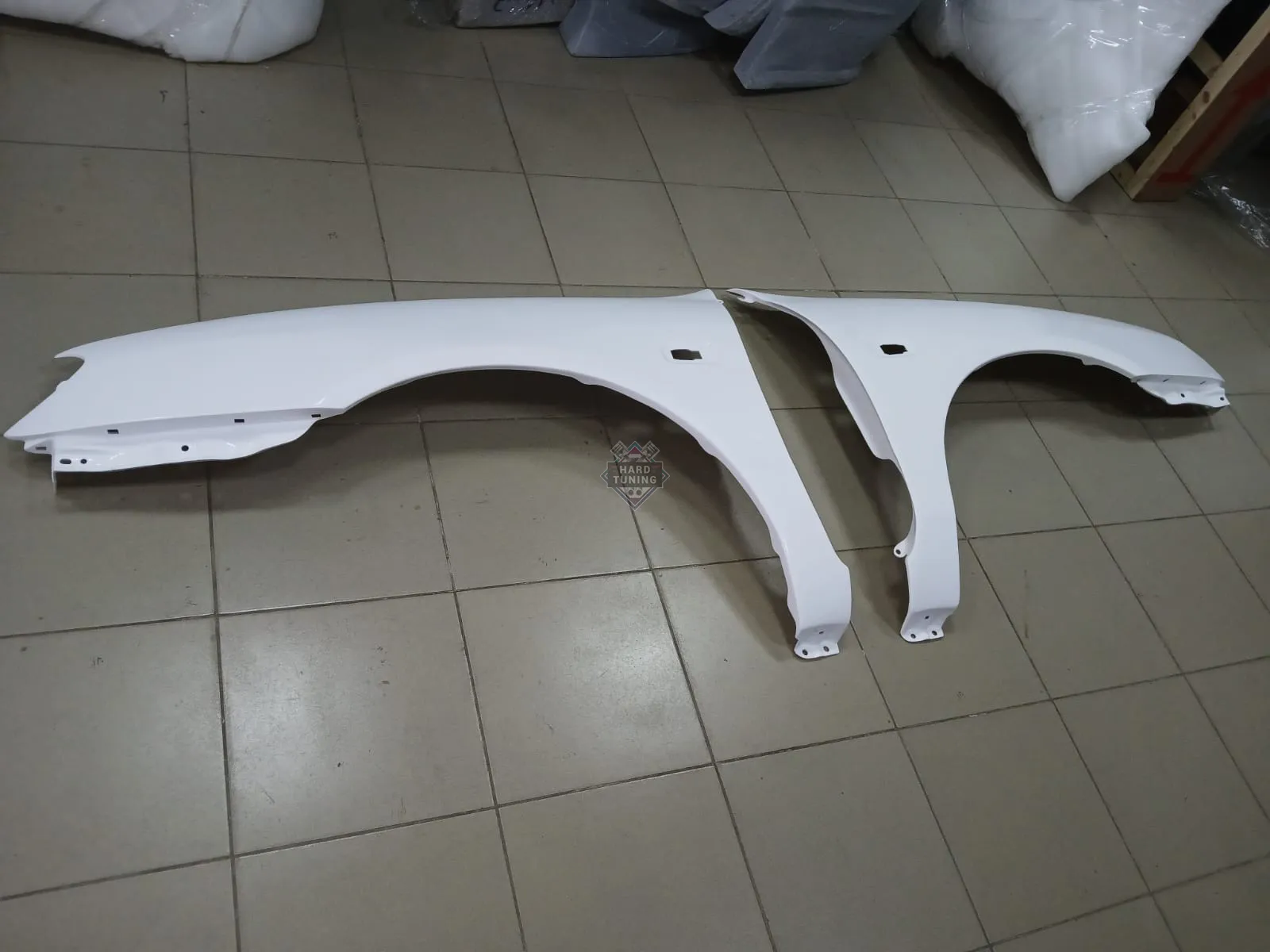 Передние крылья Nissan Primera P11 рест пластиковые штатные комплект