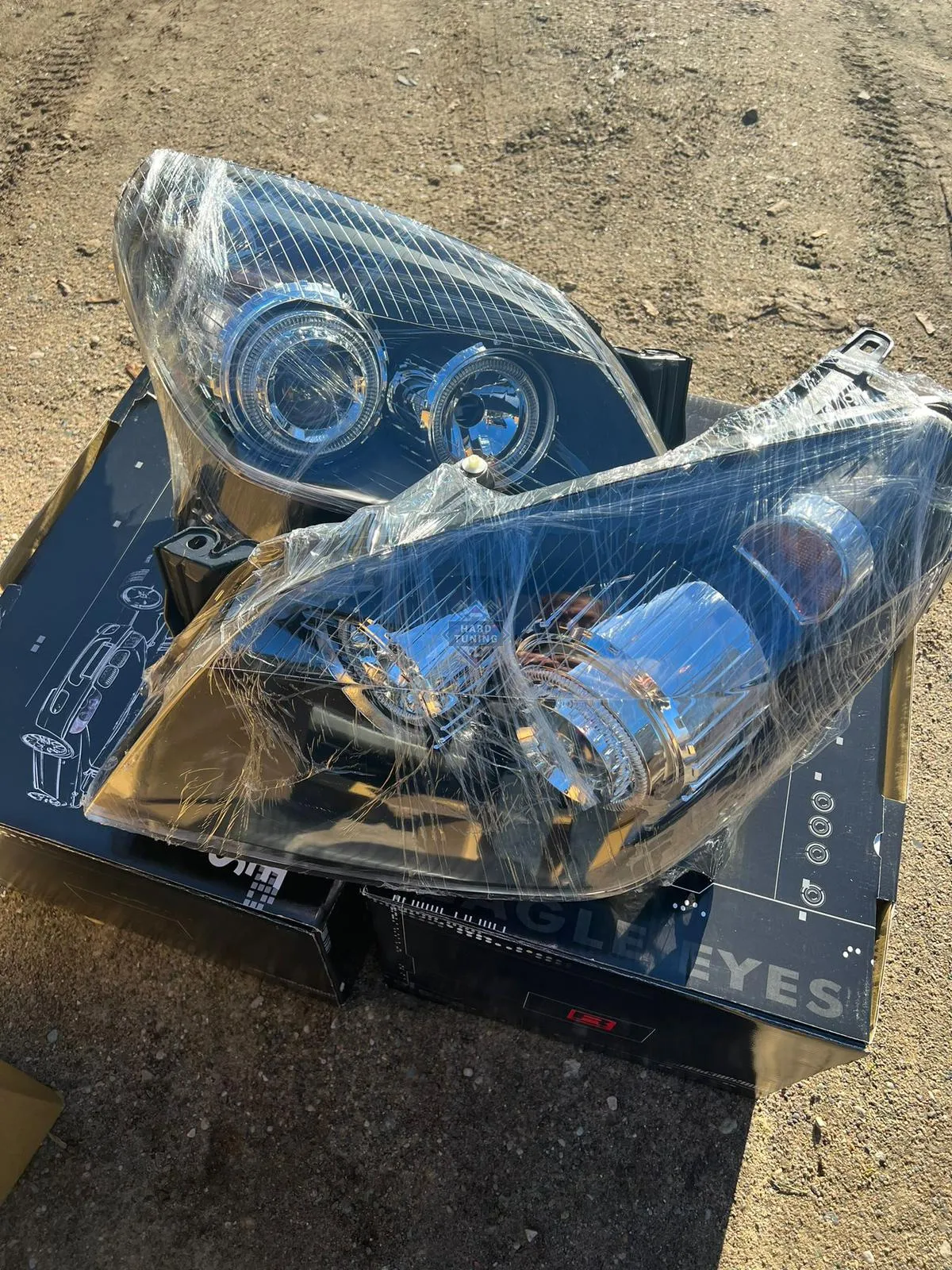 Передние фары Opel Astra H (2004-2009) Angel Eyes черные