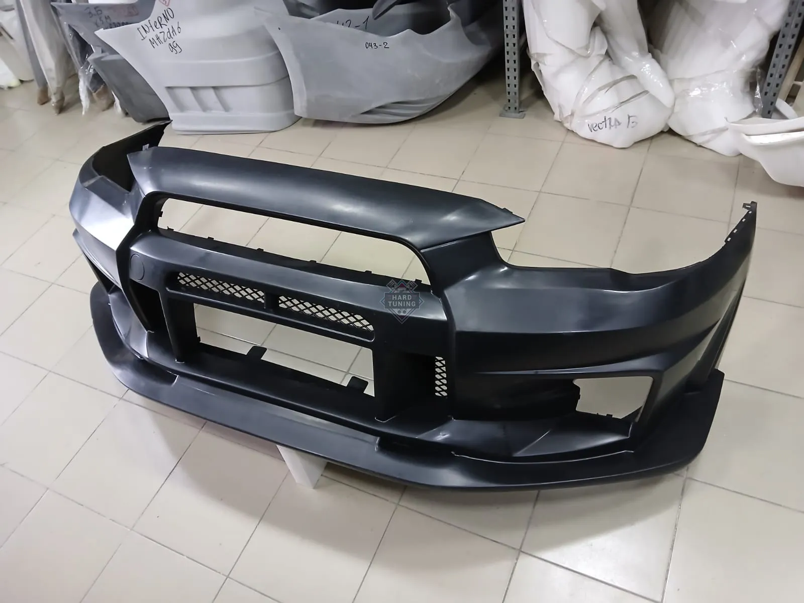 Передний бампер VARIS Mitsubishi Lancer 10