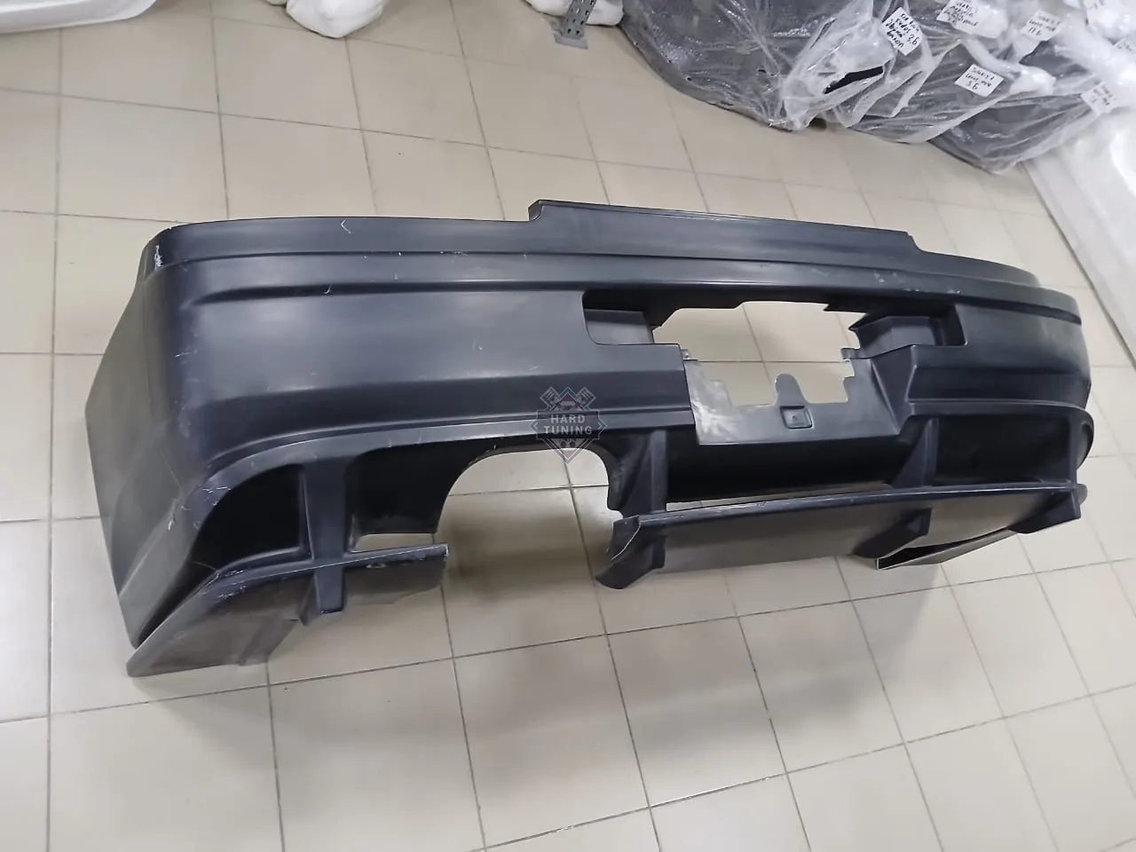 Задний бампер Do-Luck Nissan Skyline R34 GT-R