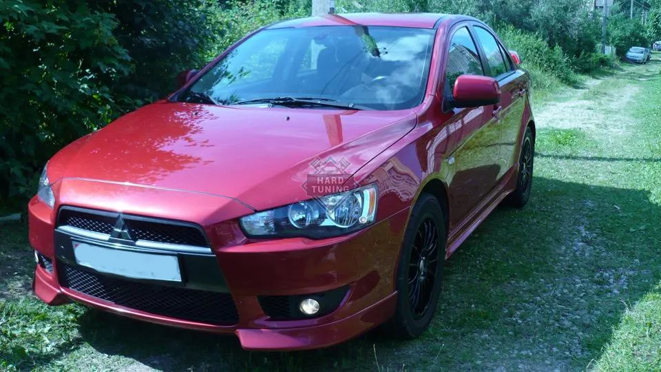 Накладки на передний бампер клыки Mitsubishi Lancer 10 (2007-2011) дорестайлинг стеклопластик