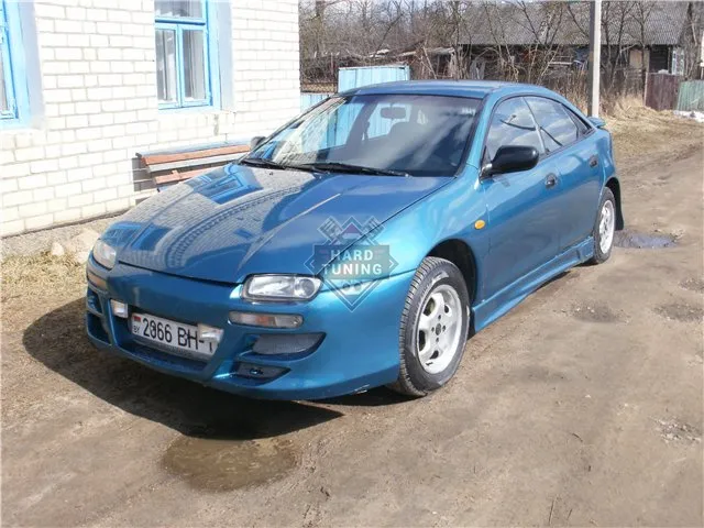 Передний бампер WEBER SPORT Mazda 323 F