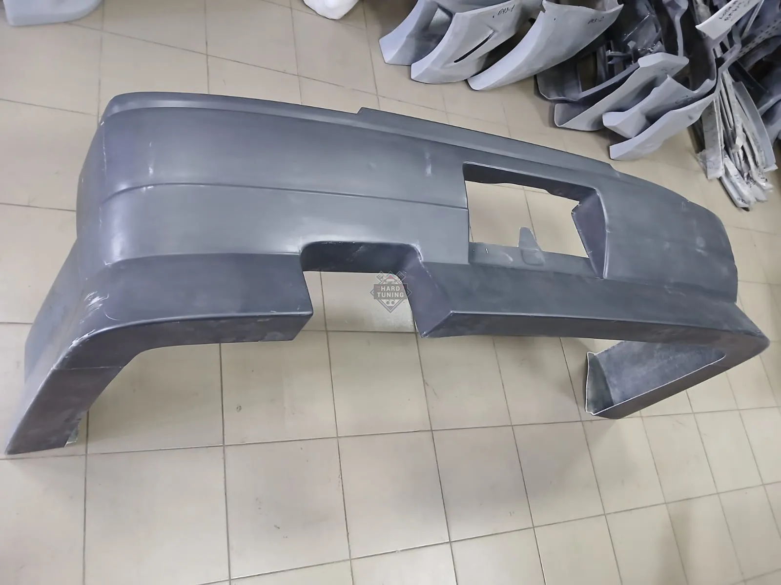 Задний бампер URAS Nissan Skyline R34