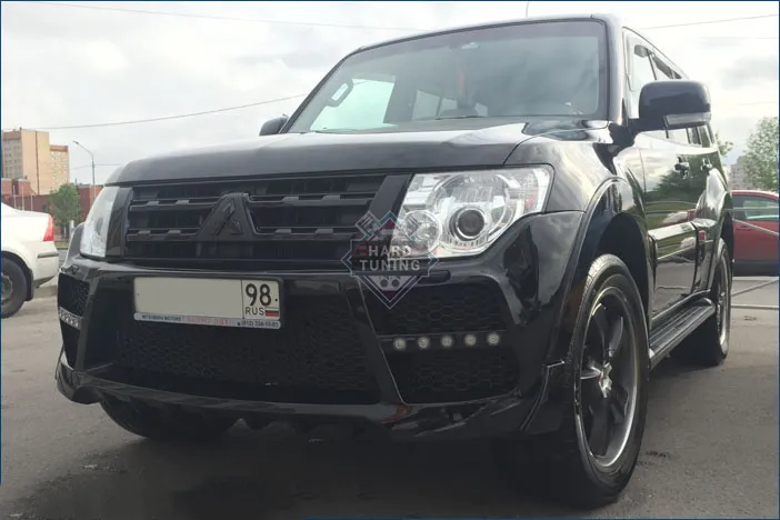 Передний бампер HT Mitsubishi Pajero 4 (2006-2014) дорестайлинг и 1й рестайлинг