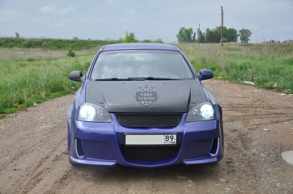 Передний бампер RIEGER-STYLE Chevrolet Lacetti седан
