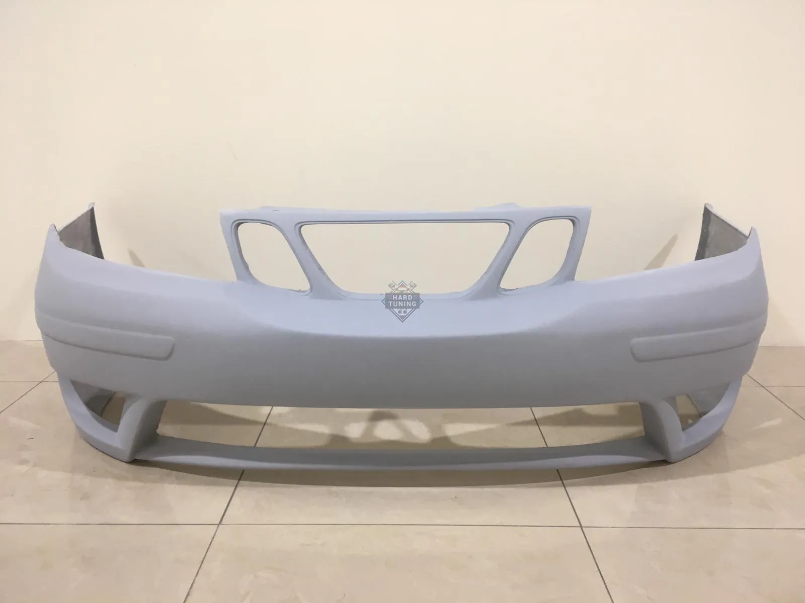 Передний бампер Saab 9-5 дорестайл