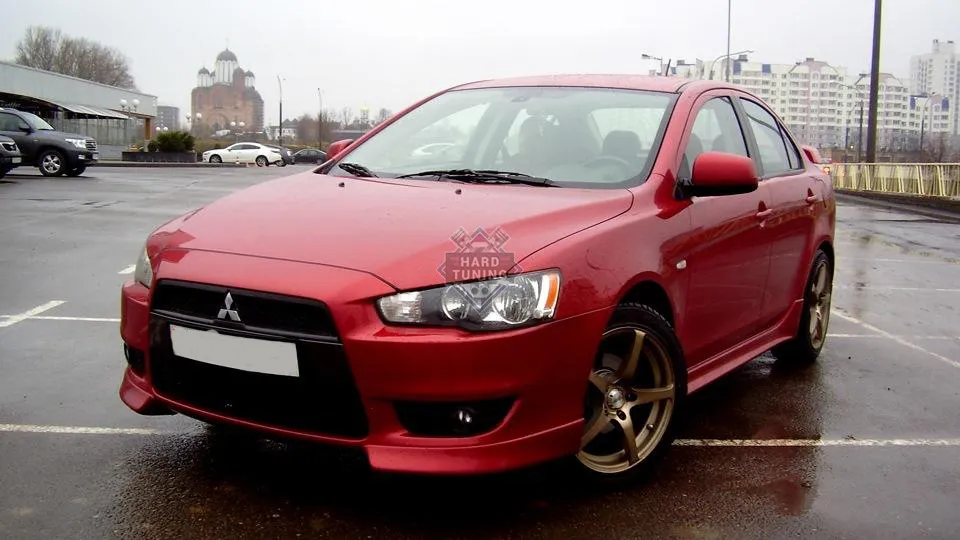 Накладки на передний бампер клыки Mitsubishi Lancer 10 (2007-2011) дорестайлинг стеклопластик