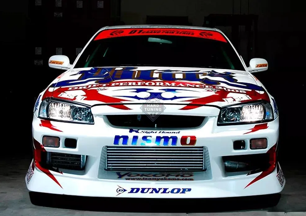 Передний бампер URAS Nissan Skyline R34