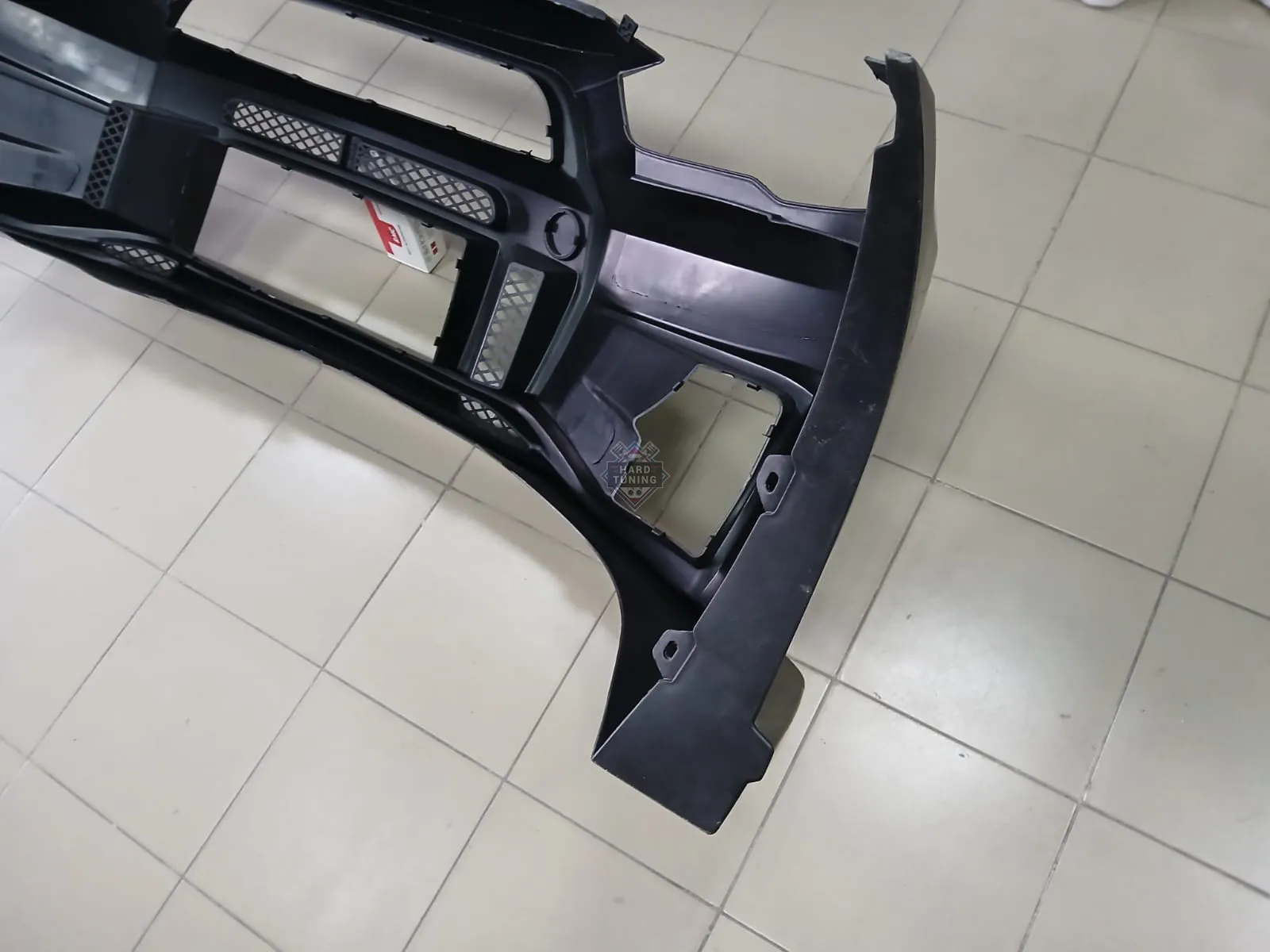 Передний бампер VARIS Mitsubishi Lancer 10