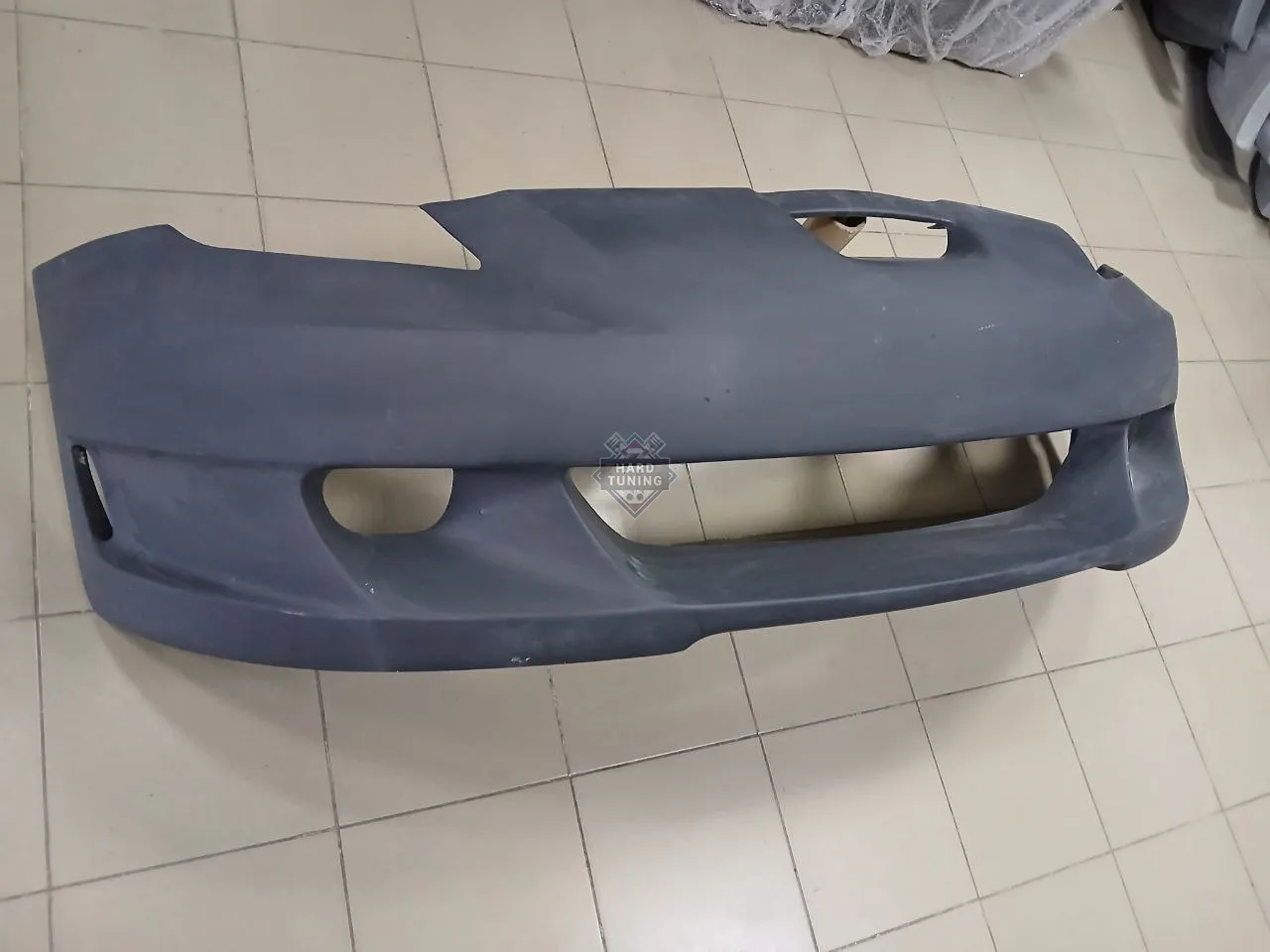 Передний бампер KAMINARI Toyota Celica T23