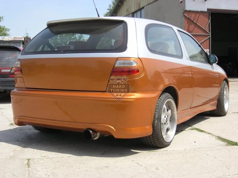 Задний бампер ST Nissan Almera N15
