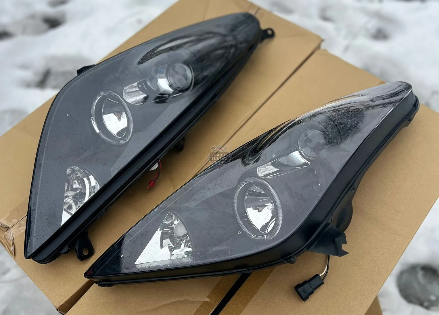 Передние фары Toyota Celica T230 (1999-2005) Angel Eyes черные