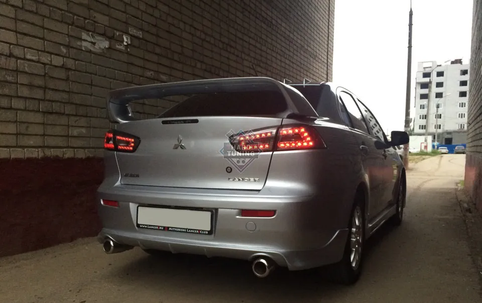 Накладка на задний бампер ZODIAK под двойной выхлоп Mitsubishi Lancer 10 (2007-2016) стеклопластик