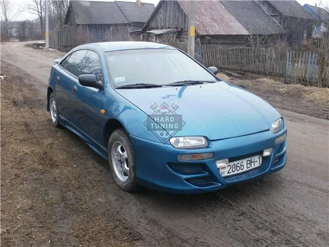 Передний бампер WEBER SPORT Mazda 323 F