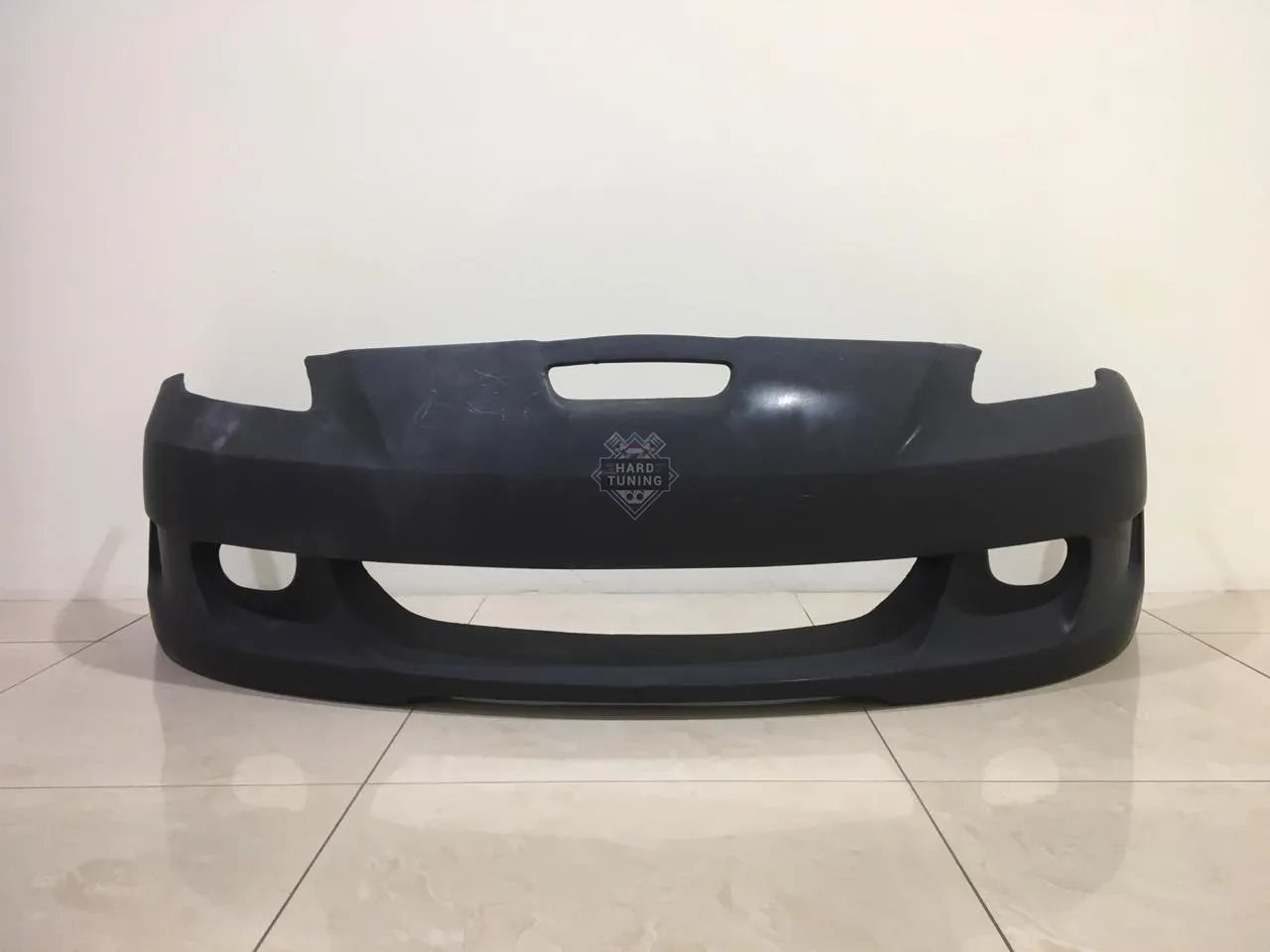 Передний бампер KAMINARI Toyota Celica T23