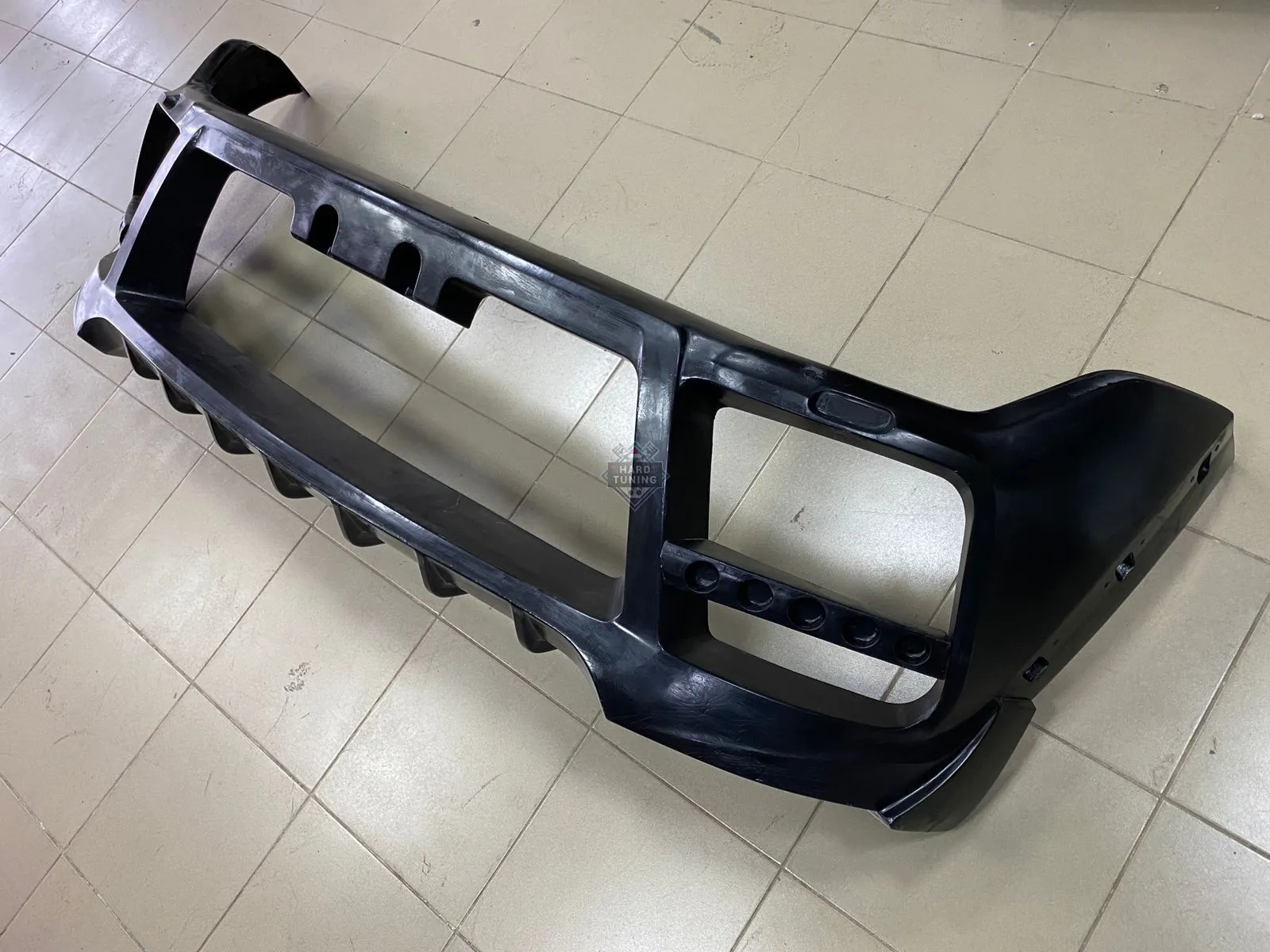 Передний бампер HT Mitsubishi Pajero 4 (2006-2014) дорестайлинг и 1й рестайлинг