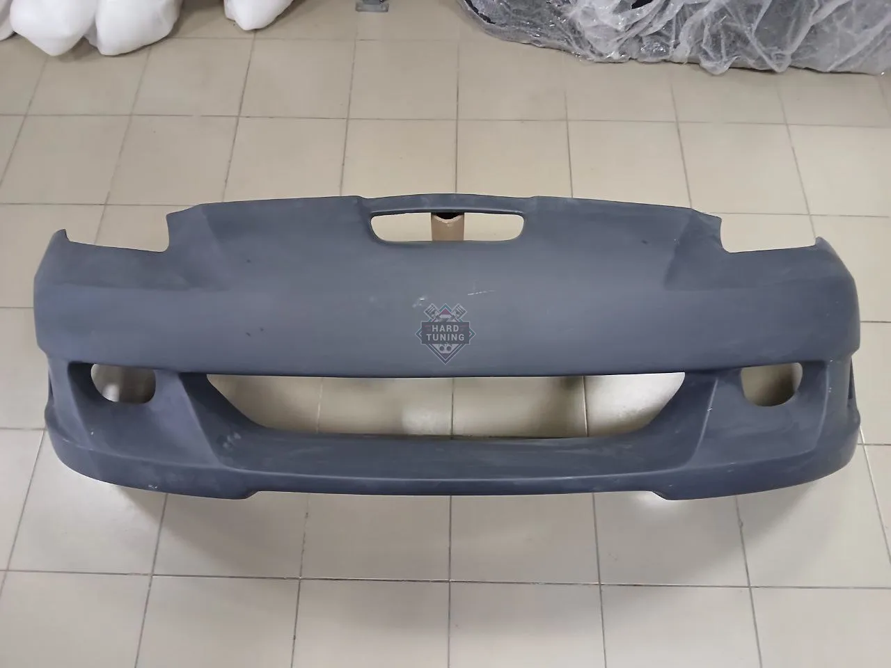 Передний бампер KAMINARI Toyota Celica T23