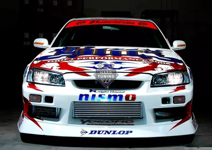 Передний бампер URAS Nissan Skyline R34