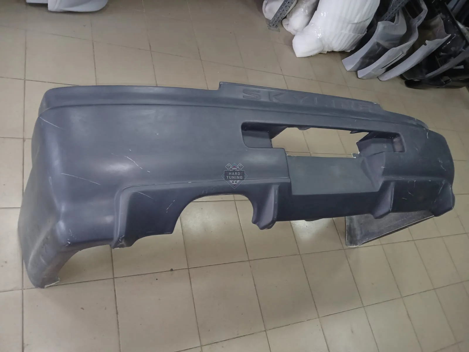 Задний бампер GTR Japan Nissan Skyline R34 седан