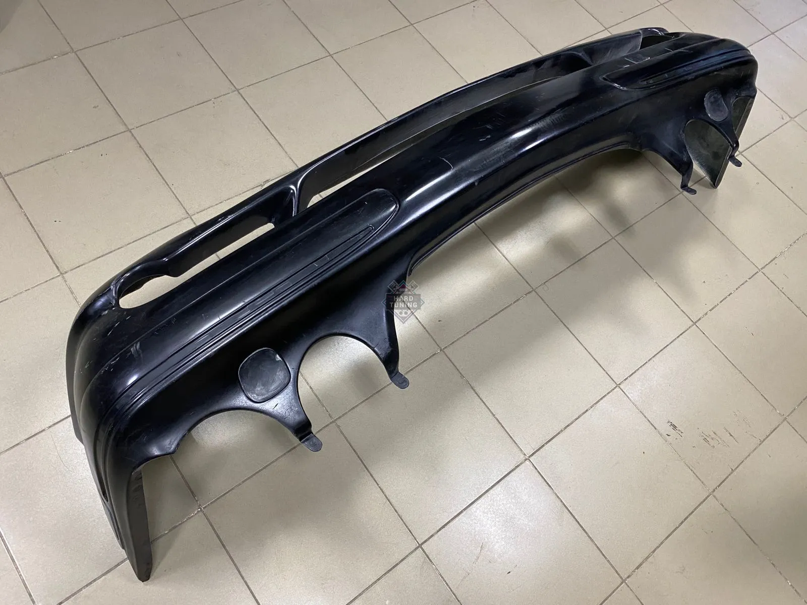 Передний бампер AMG 55 Mercedes E-Class W210 рестайлинг