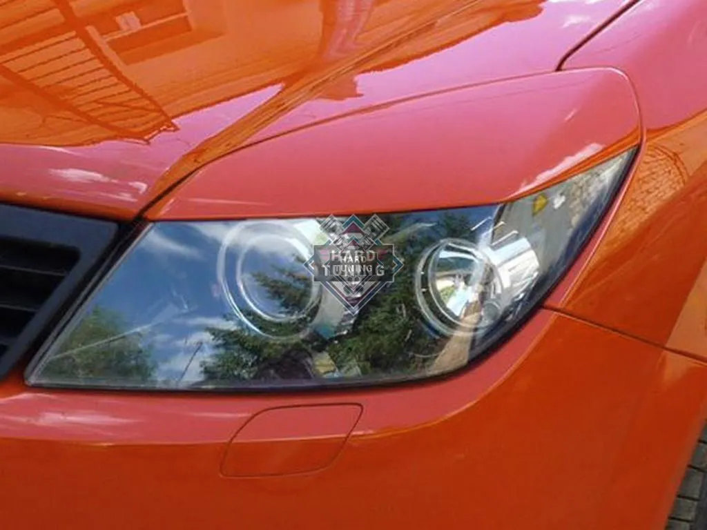 Накладки на фары широкие Opel Astra H/GTC (2005-2011)