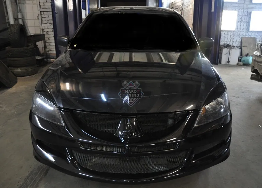 Передний бампер в стиле EVO Mitsubishi Lancer 9 (2003-2009)