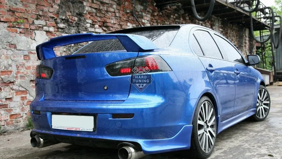 Накладка на задний бампер ZODIAK под двойной выхлоп Mitsubishi Lancer 10 (2007-2016) стеклопластик