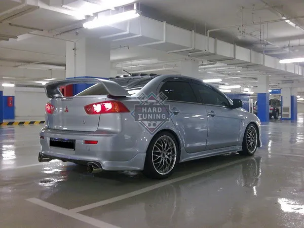 Накладка на задний бампер ZODIAK под двойной выхлоп Mitsubishi Lancer 10 (2007-2016) стеклопластик