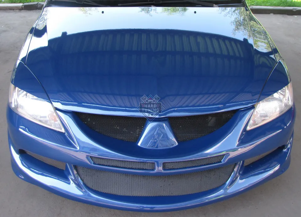 Передний бампер в стиле EVO Mitsubishi Lancer 9 (2003-2009)