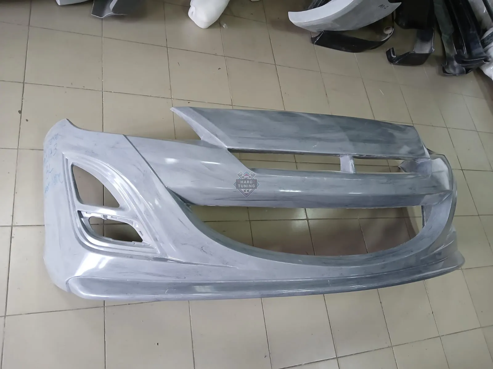 Передний бампер AUTOEXE Mazda 3 BL седан / хетчбек