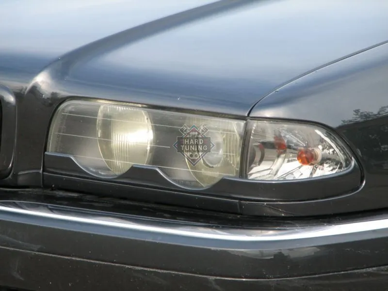 Накладки на фары нижние BMW E38