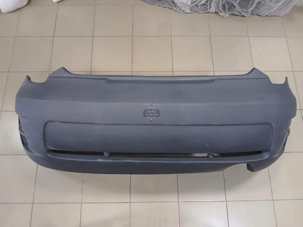 Задний бампер KAMINARI Toyota Celica T23