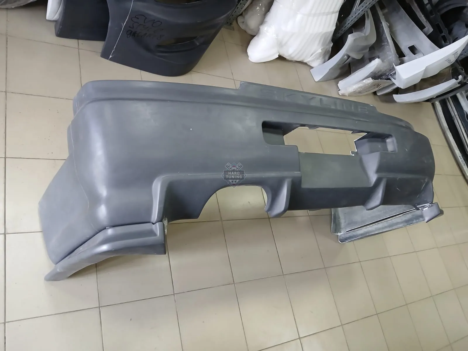 Задний бампер GTR + NISMO Nissan Skyline R34 седан