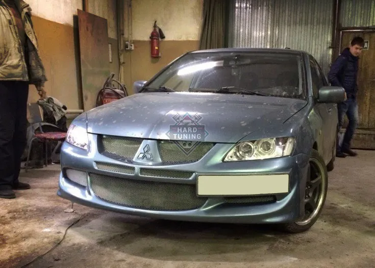 Передний бампер в стиле EVO Mitsubishi Lancer 9 (2003-2009)