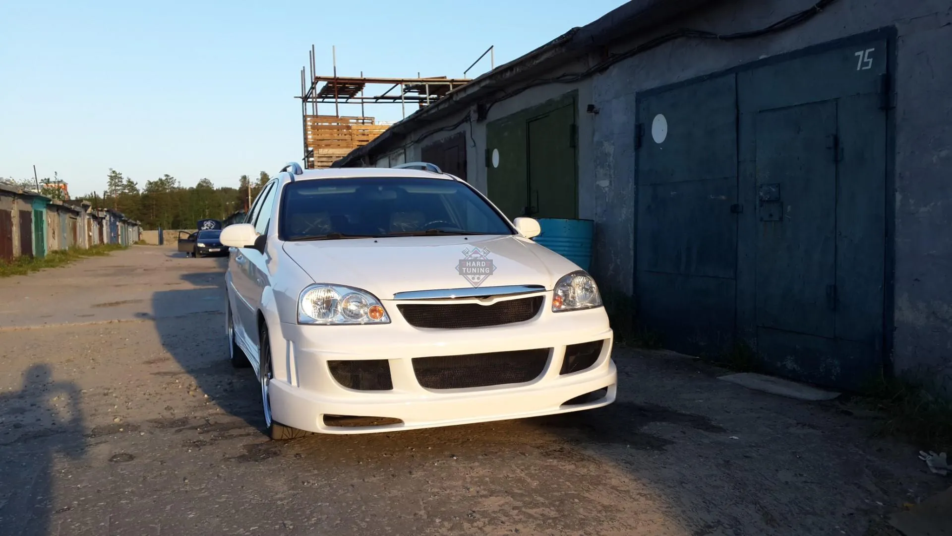 Передний бампер HT Chevrolet Lacetti седан