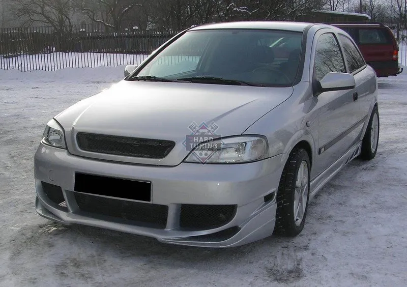 Передний бампер Carzone Opel Astra G